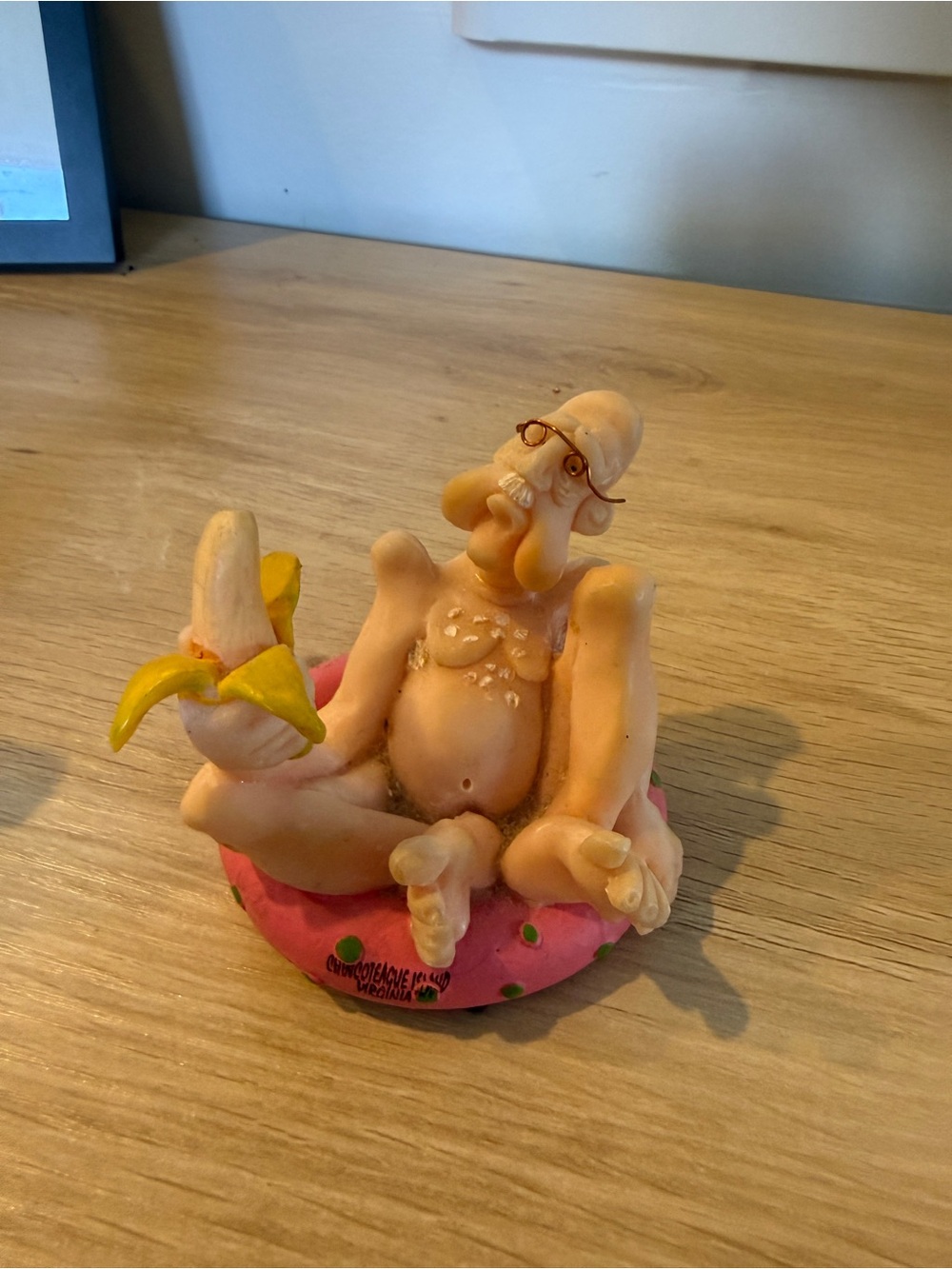 Seated Character with Banana - desk decor